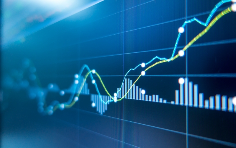 stock charts on screen growing in the positive